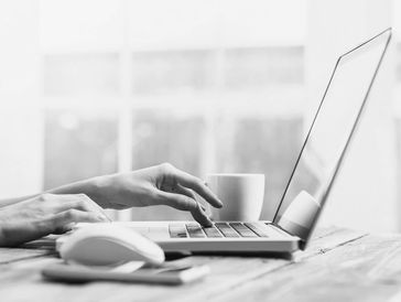 a woman working with a laptop