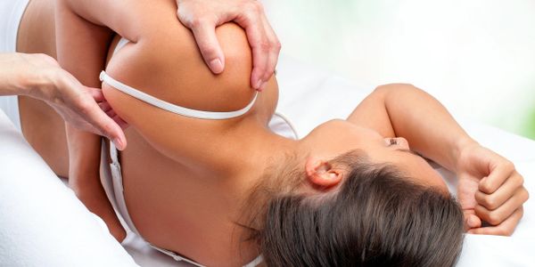 woman receiving a massage treatment