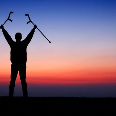Man with crutches. 