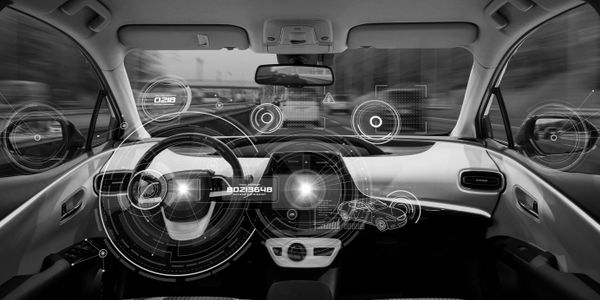 Futuristic car interior with digital HUD displays and autonomous driving interface.