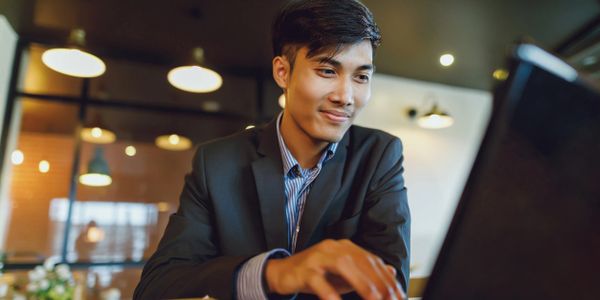 young man working on laptop